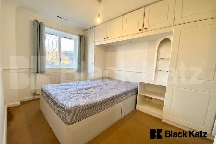 Two bedroomed house with study room, conservatory, parking & charming garden   Kinburn Street, Rotherhithe/Canada Water. 